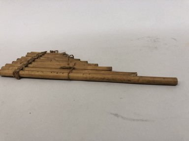 Tukano. <em>Flute</em>, early 20th century. Bamboo, plant fiber, 10 × 3 1/2 × 1/2 in. (25.4 × 8.9 × 1.3 cm). Brooklyn Museum, Museum Expedition 1933, Purchased with funds given by Jesse Metcalf, 33.609. Creative Commons-BY (Photo: Brooklyn Museum, CUR.33.609_view01.jpg)
