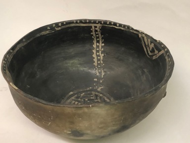 Bufiano. <em>Bowl</em>, early 20th century. Ceramic, pigment, 7 × 14 1/4 × 12 1/4 in. (17.8 × 36.2 × 31.1 cm). Brooklyn Museum, Museum Expedition 1933, Purchased with funds given by Jesse Metcalf, 33.631. Creative Commons-BY (Photo: Brooklyn Museum, CUR.33.631_view01.jpeg)