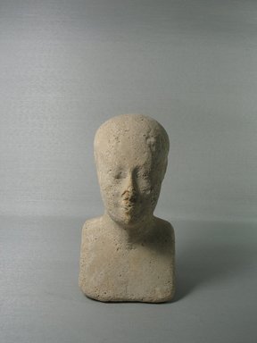  <em>Sculptor's Model of a Head of a Priest</em>, 664–525 B.C.E. Plaster, 6 1/8 × 3 3/8 × 3 1/4 in. (15.5 × 8.5 × 8.2 cm). Brooklyn Museum, Charles Edwin Wilbour Fund, 34.1006. Creative Commons-BY (Photo: , CUR.34.1006_view01.jpg)