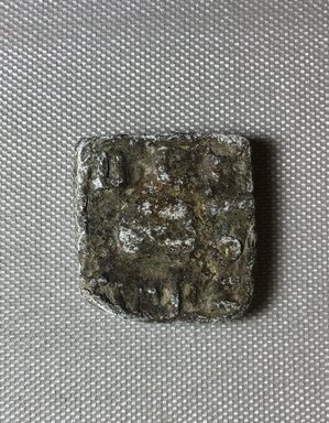 Greek. <em>Two Weights</em>. Lead, 34.1215a: 5/16 × 1 7/16 × 1 3/8 in., 0.2 lb. (0.8 × 3.7 × 3.5 cm, 87 g). Brooklyn Museum, Charles Edwin Wilbour Fund, 34.1215a-b. Creative Commons-BY (Photo: , CUR.34.1215a_view01.jpg)