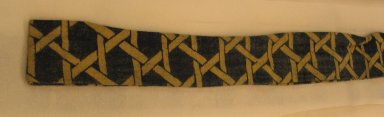  <em>Workman's Sash</em>. Printed cotton, cardboard, 34.1248.1: 2 3/8 x 143 5/16 in. (6 x 364 cm). Brooklyn Museum, Brooklyn Museum Collection, 34.1248. Creative Commons-BY (Photo: Brooklyn Museum, CUR.34.1248.jpg)