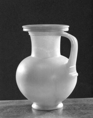  <em>Globular Pitcher with Cover</em>, ca. 1479-1353 B.C.E. Egyptian alabaster (calcite), 9 1/4 × Diam. 7 1/2 in. (23.5 × 19 cm). Brooklyn Museum, Charles Edwin Wilbour Fund, 34.1299a-b. Creative Commons-BY (Photo: Brooklyn Museum, CUR.34.1299a-b_NegA_print_bw.jpg)