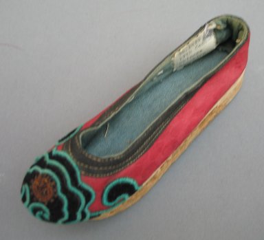  <em>Child's Shoe</em>, 19th century. Leather, cloth cotton, twill cotton, 1 15/16 x 5 7/8 in. (5 x 15 cm). Brooklyn Museum, Brooklyn Museum Collection, 34.1499. Creative Commons-BY (Photo: Brooklyn Museum, CUR.34.1499_view1.jpg)