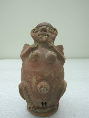  <em>Rattle in the Form of a Female Figurine</em>. Ceramic, red slip, 6 1/8 x 3 1/4 x 3 3/4 in. (15.5 x 8.3 x 9.5 cm). Brooklyn Museum, Alfred W. Jenkins Fund, 34.2140. Creative Commons-BY (Photo: Brooklyn Museum, CUR.34.2140_front.jpg)