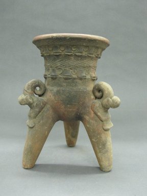  <em>Tripod Bowl</em>, 400-700. Ceramic, red slip, 8 1/2 x 6 1/16 x 6 1/4 in. (21.6 x 15.4 x 15.9 cm). Brooklyn Museum, Alfred W. Jenkins Fund, 34.2599. Creative Commons-BY (Photo: Brooklyn Museum, CUR.34.2599_view1.jpg)