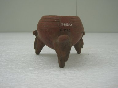  <em>Tripod Bowl</em>, 300-800. Ceramic, red slip, 3 3/16 x 4 5/8 x 4 5/8 in. (8.1 x 11.7 x 11.7 cm). Brooklyn Museum, Alfred W. Jenkins Fund, 34.2745. Creative Commons-BY (Photo: Brooklyn Museum, CUR.34.2745.jpg)