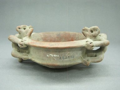  <em>Tripod Bowl</em>, 500-1000. Ceramic, red slip, 2 7/8 x 7 1/2 x 5 in. (7.3 x 19.1 x 12.7 cm). Brooklyn Museum, Alfred W. Jenkins Fund, 34.2994. Creative Commons-BY (Photo: Brooklyn Museum, CUR.34.2994_view1.jpg)
