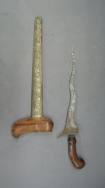  <em>Kris (Dagger) with Scabbard</em>. Wood, metal, 5 5/8 x 19 7/16 in. (14.3 x 49.3 cm). Brooklyn Museum, Brooklyn Museum Collection, 34.51a-b. Creative Commons-BY (Photo: Brooklyn Museum, CUR.34.51a-b.jpg)