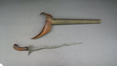  <em>Kris (Dagger) with Scabbard</em>. Wood, metal, 7 11/16 x 19 in. (19.5 x 48.3 cm). Brooklyn Museum, Brooklyn Museum Collection, 34.52a-b. Creative Commons-BY (Photo: Brooklyn Museum, CUR.34.52a-b.jpg)