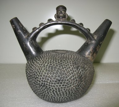 Chimú. <em>Double Spout and Bridge Handle Bottle</em>, ca.1100-1400. Ceramic, 7 x 8 1/2 x 5 1/2 in. (17.8 x 21.6 x 14 cm). Brooklyn Museum, Alfred W. Jenkins Fund, 34.5530. Creative Commons-BY (Photo: Brooklyn Museum, CUR.34.5530.jpg)