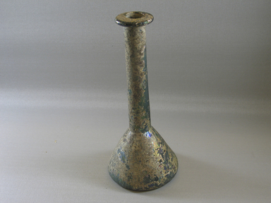 Roman. <em>Bottle with Conical Body</em>, 1st-early 8th century C.E. Glass, 8 7/8 x diam. 3 3/4 in. (22.5 x 9.5 cm). Brooklyn Museum, Brooklyn Museum Collection, 34.5586. Creative Commons-BY (Photo: Brooklyn Museum, CUR.34.5586_view1.jpg)