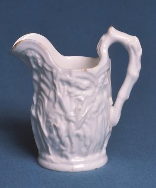 Attributed to Charles Cartlidge & Co. (1848–1856). <em>Pitcher</em>, ca. 1865. Porcelain, 5 3/4 x 5 1/2 x 3 3/8 in. (14.6 x 14 x 8.6 cm). Brooklyn Museum, Gift of Mrs. William Roach, 34.5863. Creative Commons-BY (Photo: Brooklyn Museum, CUR.34.5863.jpg)