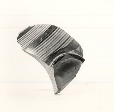 Mycenaean. <em>Base and Lower Part of Small Vase</em>, ca. 1352-1336 B.C.E. Clay, pigment, 1 5/16 x 2 5/8 in. (3.4 x 6.7 cm). Brooklyn Museum, Gift of the Egypt Exploration Society, 34.6043a. Creative Commons-BY (Photo: Brooklyn Museum, CUR.34.6043a_print_NegB_bw.jpg)