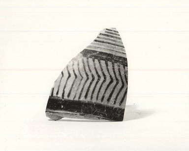 Mycenaean. <em>Small Fragment from Body of Jar</em>, ca. 1352-1336 B.C.E. Clay, pigment, 1 9/16 x 2 1/4 in. (4 x 5.7 cm). Brooklyn Museum, Gift of the Egypt Exploration Society, 34.6043b. Creative Commons-BY (Photo: Brooklyn Museum, CUR.34.6043b_print_NegB_bw.jpg)