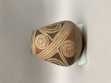 Pueblo (unidentified). <em>Jar with red and black lines, spiral and checkered patterns on cream ground</em>. Clay, slip, 8 1/2 × 8 1/4 × 8 1/4 in. (21.6 × 21 × 21 cm). Brooklyn Museum, Brooklyn Museum Collection, 34.639. Creative Commons-BY (Photo: Brooklyn Museum, CUR.34.639_view01.jpg)