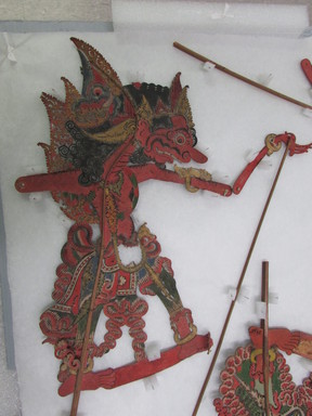 <em>Shadow Play Figure (Wayang kulit)</em>. Leather, pigment, wood, fiber, 23 5/8 × 13 in. (60 × 33 cm). Brooklyn Museum, Brooklyn Museum Collection, 34.69. Creative Commons-BY (Photo: , CUR.34.69_overall.jpg)