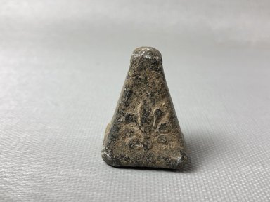 Greek. <em>Pyramidal Weight</em>, 5th century B.C.E. Lead, 1 1/4 × 15/16 × 11/16 in., 0.2 lb. (3.1 × 2.4 × 1.8 cm, 74.7 g). Brooklyn Museum, Charles Edwin Wilbour Fund, 34.710. Creative Commons-BY (Photo: , CUR.34.710_view01.jpg)