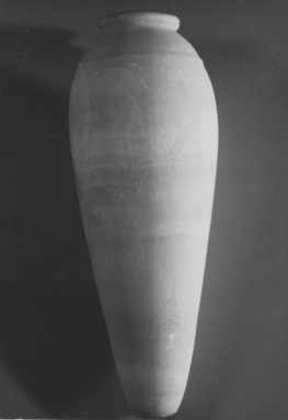  <em>Jar from Djoser’s Pyramid Complex</em>, ca. 2675-2625 B.C.E. Egyptian alabaster (calcite), 23 1/16 x 5 1/16 in. (58.5 x diam. 12.8 cm). Brooklyn Museum, Charles Edwin Wilbour Fund, 34.977. Creative Commons-BY (Photo: , CUR.34.977_NegB_print_bw.jpg)