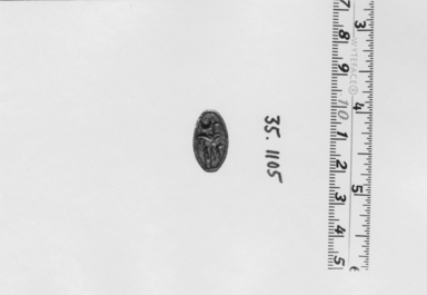  <em>Seal</em>. Steatite, glaze, 1/4 x 7/16 x 13/16 in. (0.6 x 1.1 x 2 cm). Brooklyn Museum, Gift of Theodora Wilbour from the collection of her father, Charles Edwin Wilbour, 35.1105. Creative Commons-BY (Photo: , CUR.35.1105_NegA_print_bw.jpg)