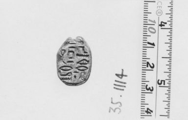  <em>Scarab of Redi-ni-ptah</em>, ca. 1630-1539 B.C.E. Steatite, glaze, 5/16 x 9/16 x 7/8 in. (0.8 x 1.5 x 2.2 cm). Brooklyn Museum, Gift of Theodora Wilbour from the collection of her father, Charles Edwin Wilbour, 35.1114. Creative Commons-BY (Photo: , CUR.35.1114_NegA_print_bw.jpg)
