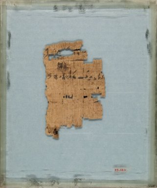  <em>Papyrus Fragment Inscribed in Demotic</em>, 305–30 B.C.E. Papyrus, ink, Glass: 6 5/16 x 7 1/2 in. (16 x 19 cm). Brooklyn Museum, Gift of Theodora Wilbour from the collection of her father, Charles Edwin Wilbour, 35.1211 (Photo: Brooklyn Museum, CUR.35.1211_IMLS_PS5.jpg)