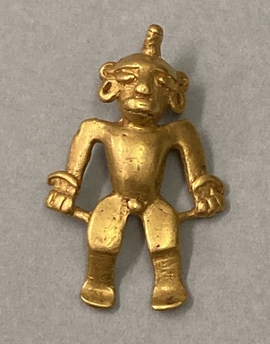  <em>Pendant in the Form of a Human Figure</em>. Gold, 1 11/16 × 1 1/8 × 5/16 in. (4.3 × 2.9 × 0.8 cm). Brooklyn Museum, Alfred W. Jenkins Fund, 35.125. Creative Commons-BY (Photo: Brooklyn Museum, CUR.35.125_overall.jpg)