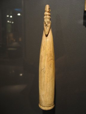  <em>Hippopotamus Tusk with Carved Head</em>, ca. 3800-3400 B.C.E. Hippopotamus ivory, 8 5/8 × 1 5/16 in. (21.9 × 3.3 cm). Brooklyn Museum, Charles Edwin Wilbour Fund, 35.1266. Creative Commons-BY (Photo: Brooklyn Museum, CUR.35.1266_erg3.jpg)