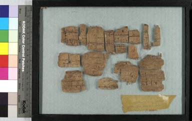  <em>Papyrus Fragments Inscribed in Greek or Coptic</em>, 395–642 C.E. Papyrus, ink, Glass: 8 7/16 x 11 1/4 in. (21.5 x 28.5 cm). Brooklyn Museum, Gift of Theodora Wilbour, 35.1457 (Photo: Brooklyn Museum, CUR.35.1457_front_IMLS_PS5.jpg)