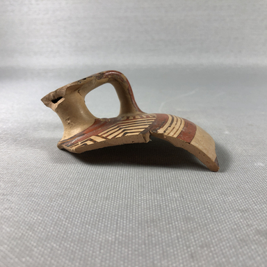 Mycenaean. <em>Fragment of a Mycenaean Bottle</em>, ca. 1425-1300 B.C.E. Clay, pigment, Greatest Diam. 3 1/16 in. (7.8 cm). Brooklyn Museum, Gift of the Egypt Exploration Society, 35.2019. Creative Commons-BY (Photo: , CUR.35.2018_35.2019_35.2020_view01.jpg)