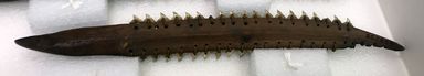 Kiribati. <em>Shark Teeth Sword</em>. Wood, shark teeth, sennit, 15 3/8 x 1 15/16 in (39 x 5 cm). Brooklyn Museum, Gift of Appleton Sturgis, 35.2224. Creative Commons-BY (Photo: , CUR.35.2224_overall.jpg)