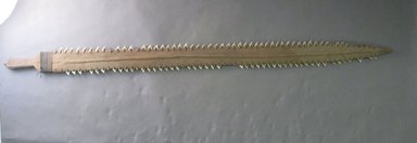 Kiribati. <em>Shark Teeth Sword</em>. Wood, shark teeth, sennit, 48 3/8 x 3 7/16 in (122.8 x 8.7 cm). Brooklyn Museum, Gift of Appleton Sturgis, 35.2225. Creative Commons-BY (Photo: Brooklyn Museum, CUR.35.2225_overall.jpg)
