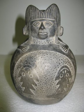 Chimú. <em>Double- chambered Stirrup Spout Bottle</em>, 1100-1470. Ceramic, 7 x 8 x 5 in. (17.8 x 20.3 x 12.7 cm). Brooklyn Museum, Gift of Dr. Edward S. Hawes, 35.2249. Creative Commons-BY (Photo: Brooklyn Museum, CUR.35.2249.jpg)