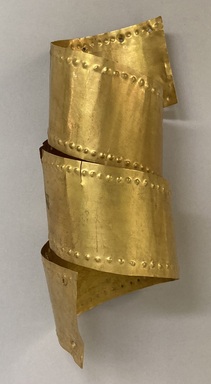 Calima. <em>Head Band</em>, 100 B.C.E. – 800 C.E. Gold, 2 1/4 × 3 × 7 1/2 in. (5.7 × 7.6 × 19.1 cm). Brooklyn Museum, Alfred W. Jenkins Fund, 35.364. Creative Commons-BY (Photo: Brooklyn Museum, CUR.35.364.jpg)