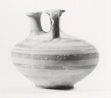 Mycenaean. <em>Lesser Stirrup-Jar</em>, ca. 1330-1190 B.C.E. Clay, slip, 3 15/16 x Diam. 4 9/16 in. (10 x 11.6 cm). Brooklyn Museum, Charles Edwin Wilbour Fund, 35.738. Creative Commons-BY (Photo: Brooklyn Museum, CUR.35.738_print_NegC_bw.jpg)