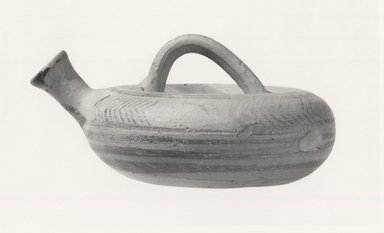 Mycenaean. <em>Ring-Shaped Askos</em>, ca.1250 B.C.E. Clay, slip, Diam. 3 3/4 in. (9.5 cm). Brooklyn Museum, Museum Collection Fund, 35.739. Creative Commons-BY (Photo: Brooklyn Museum, CUR.35.739_print_NegA_bw.jpg)