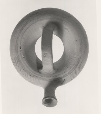 Mycenaean. <em>Ring-Shaped Askos</em>, ca.1250 B.C.E. Clay, slip, Diam. 3 3/4 in. (9.5 cm). Brooklyn Museum, Museum Collection Fund, 35.739. Creative Commons-BY (Photo: Brooklyn Museum, CUR.35.739_print_NegC_bw.jpg)