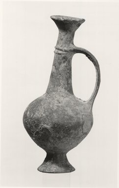 Cypriot. <em>Miniature Vase</em>, 1550-1400 B.C.E. Terracotta, 5 3/4 × Diam. 2 5/8 in. (14.6 × 6.7 cm). Brooklyn Museum, Brooklyn Museum Collection, 35.823. Creative Commons-BY (Photo: Brooklyn Museum, CUR.35.823_print_NegA_bw.jpg)