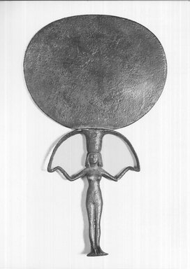  <em>Mirror</em>, ca. 1478-1352 B.C.E. Bronze, 7 3/4 x 4 3/4 x 1/2 in. (19.7 x 12 x 1.2 cm). Brooklyn Museum, Charles Edwin Wilbour Fund, 35.883. Creative Commons-BY (Photo: Brooklyn Museum, CUR.35.883_print_negA_bw.jpg)