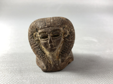  <em>Small Hathor Head</em>, ca. 1539-1075 B.C.E. Wood, pigment, gold leaf, 1 9/16 × 1 9/16 × 1 1/2 in. (4 × 4 × 3.8 cm). Brooklyn Museum, Charles Edwin Wilbour Fund, 36.124. Creative Commons-BY (Photo: , CUR.36.124_view01.jpg)