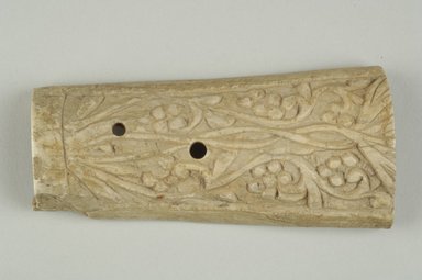 Byzantine. <em>Plaque with Botanical Decoration</em>, 5th-6th century C.E. Bone, 1 15/16 x 4 3/8 in. (4.9 x 11.1 cm). Brooklyn Museum, Frank L. Babbott Fund and Henry L. Batterman Fund, 36.168.1. Creative Commons-BY (Photo: Brooklyn Museum (in collaboration with Index of Christian Art, Princeton University), CUR.36.168.1_view1_ICA.jpg)
