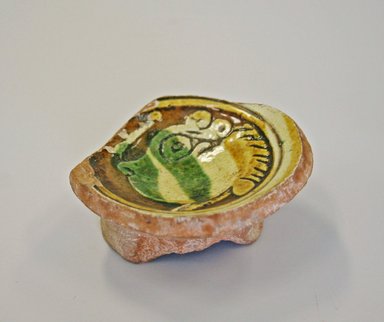 Byzantine. <em>Round Bowl on a Boss</em>, ca. 1450. Ceramic, 1 3/8 x 2 3/4 in. (3.5 x 7 cm). Brooklyn Museum, Frank L. Babbott Fund and Henry L. Batterman Fund, 36.204. Creative Commons-BY (Photo: Brooklyn Museum, CUR.36.204.jpg)