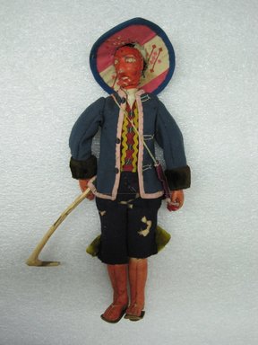  <em>Male Doll</em>, ca. 1936. Leather, wool, silk, wood, silver, 11 x 5 x 1 in. (27.9 x 12.7 x 2.5 cm). Brooklyn Museum, Gift of Dr. John H. Finney, 36.688. Creative Commons-BY (Photo: Brooklyn Museum, CUR.36.688_view1.jpg)