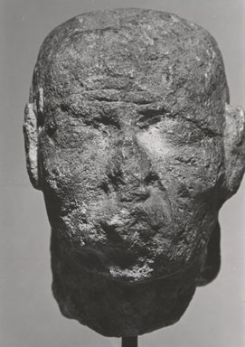  <em>Head of an Old Man</em>, 30 B.C.E.-100 C.E. Limestone, plaster, pigment, 3 3/8 x 2 3/8 x 2 15/16 in. (8.5 x 6 x 7.5 cm). Brooklyn Museum, Gift of Louis Herse, 36.744. Creative Commons-BY (Photo: Brooklyn Museum, CUR.36.744_NegL76_7_print_bw.jpg)