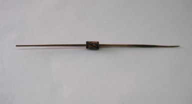 Chancay. <em>Spindle with Wooden Whorl</em>, 1000-1476. Wood, pigment, 1/2 x 8 11/16 in. (1.3 x 22 cm). Brooklyn Museum, Gift of Dr. John H. Finney, 36.755.4. Creative Commons-BY (Photo: Brooklyn Museum, CUR.36.755.4.jpg)