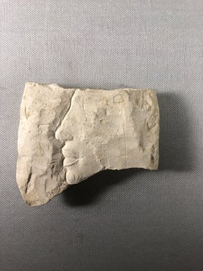  <em>Fragment of a Trial Piece</em>, ca. 1352–1336 B.C.E. Limestone, 3 7/16 × 3 15/16 × 7/8 in. (8.7 × 10 × 2.3 cm). Brooklyn Museum, Gift of the Egypt Exploration Society, 36.877. Creative Commons-BY (Photo: , CUR.36.877_view04.jpg)