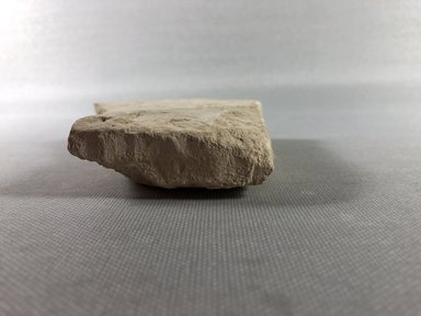  <em>Fragment of a Trial Piece</em>, ca. 1352-1336 B.C.E. Limestone, 3 7/16 × 3 15/16 × 7/8 in. (8.7 × 10 × 2.3 cm). Brooklyn Museum, Gift of the Egypt Exploration Society, 36.877. Creative Commons-BY (Photo: , CUR.36.877_view07.jpg)