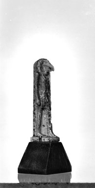  <em>Thoth Amulet</em>. Faience, 1 1/8 in. (2.8 cm). Brooklyn Museum, Charles Edwin Wilbour Fund, 37.1008E. Creative Commons-BY (Photo: Brooklyn Museum, CUR.37.1008E_NegID_37.1008E_GRPA_cropped_bw.jpg)