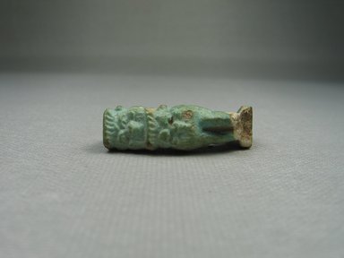  <em>Composite Amulet</em>, 664–343 B.C.E. Faience, 1 5/16 x 3/8 x 3/4 in. (3.4 x 1 x 1.9 cm). Brooklyn Museum, Charles Edwin Wilbour Fund, 37.1096E. Creative Commons-BY (Photo: Brooklyn Museum, CUR.37.1096E_view1.jpg)