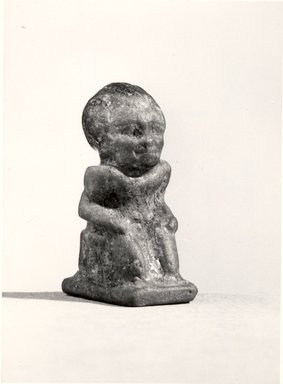 Egyptian. <em>Figure of a Nubian Captive</em>, 8th-7th century B.C.E. Faience, 1 x 1/2 x 9/16 in. (2.6 x 1.3 x 1.5 cm). Brooklyn Museum, Charles Edwin Wilbour Fund, 37.1111E. Creative Commons-BY (Photo: Brooklyn Museum, CUR.37.1111E_negB_bw.jpg)