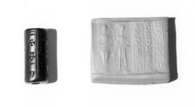 Ancient Near Eastern. <em>Cylinder Seal: Two Figures with Old Babylonian Inscription</em>, ca. 18th–17th c. B.C.E. Hematite, 7/8 x Diam. 3/8 in. (2.3 x 1 cm). Brooklyn Museum, Charles Edwin Wilbour Fund, 37.1116E. Creative Commons-BY (Photo: , CUR.37.1116E_NegB_print_bw.jpg)